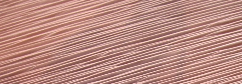 Close-up of stacked copper cathode sheet edges