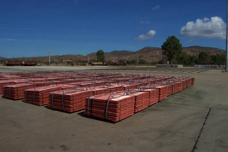 Bundled copper cathode sheets stacked in a storage yard